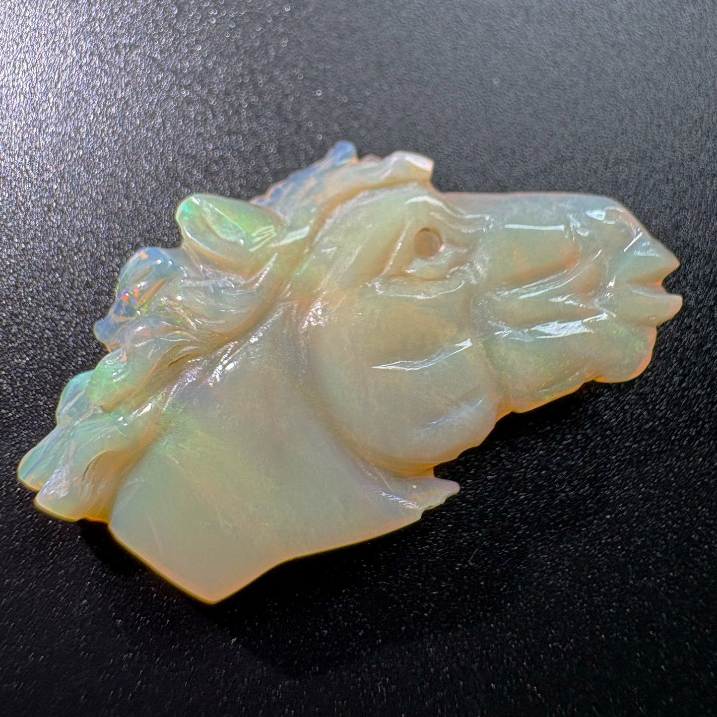 Detail of Natural Ethiopian Opal Horse Head Carving