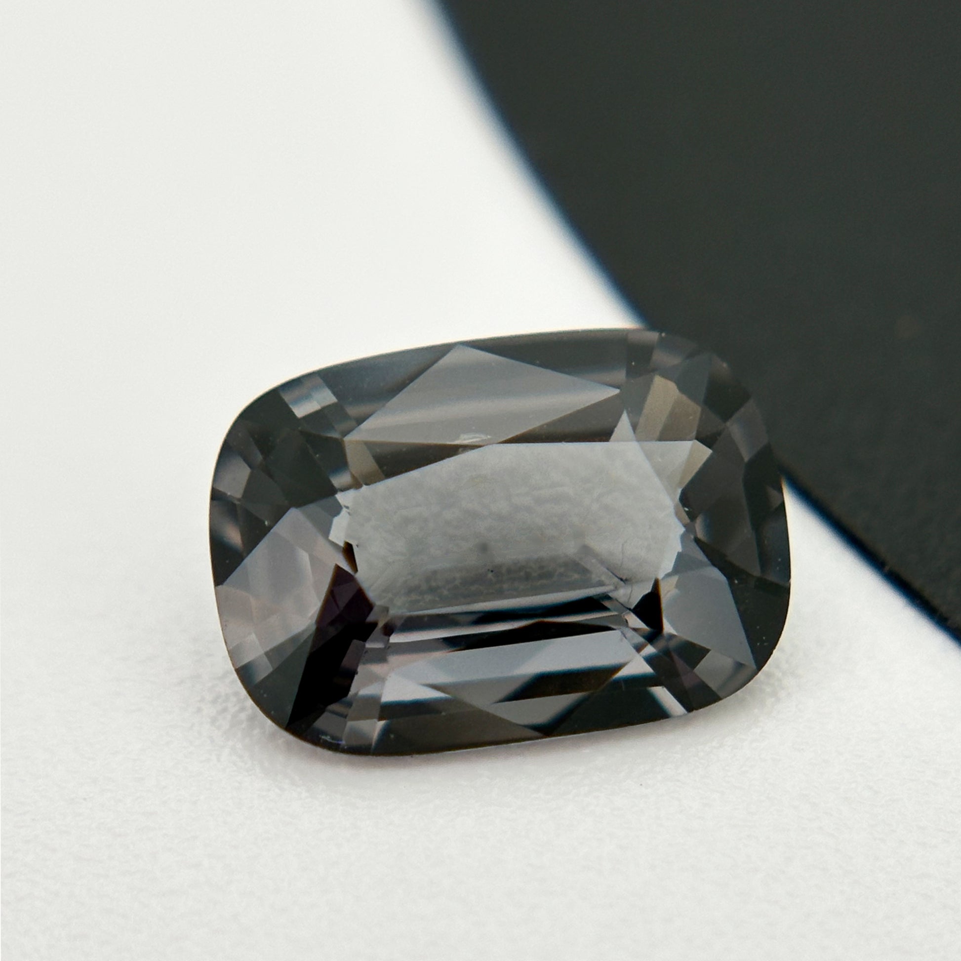 Side View of 2.35 Carat Metallic Gray Spinel Cushion Cut